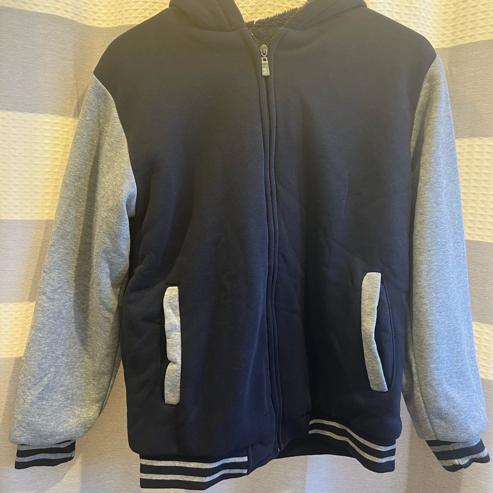 Zip up jacket - fleece lined.